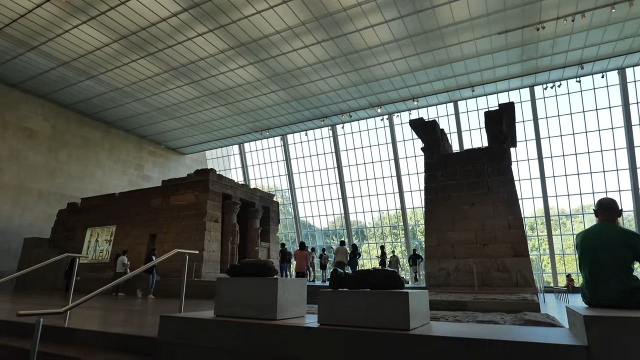 The Temple of Dendur inside the Met Museum glass atrium overlooking Central Park